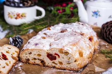 German Christmas cake Stollen with dry fruits and nuts