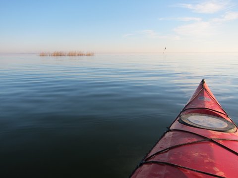View From Red Kayak On Calm Lake