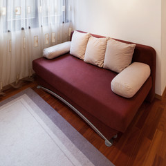 Interior, red divan