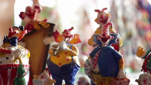Figurines of Smiling Clowns