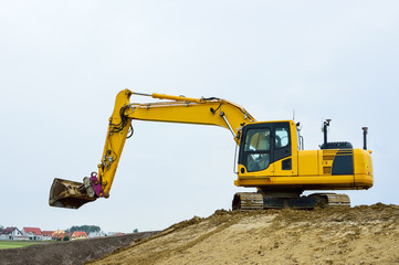 Bagger in gelb auf der Baustelle