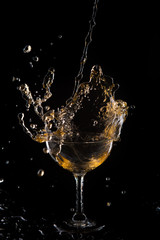 Red wine splash on black background