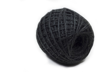 roll of black jute, string, hemp rope isolated on white background