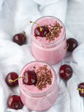 Smoothie with cherries, chocolate and nuts. Selective focus