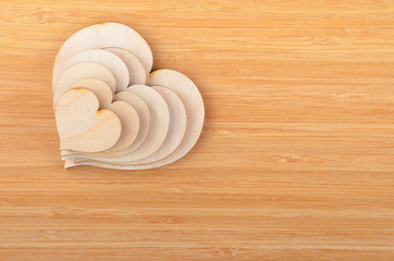 Heart on wooden background