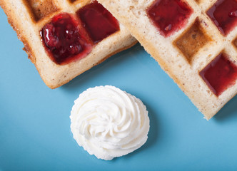 Traditional belgium soft fresh waffles with a decor on a plate