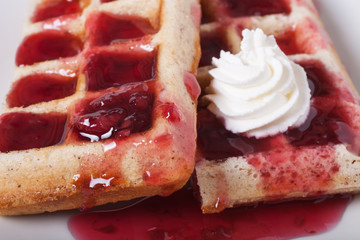 Traditional belgium soft fresh waffles with a decor on a plate