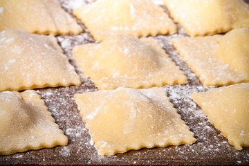 Pelmeni - Russian ravioli. Cooking process. Selective focus. Ton