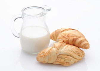 schiocco, flaky bun typical Italian; with milk jug