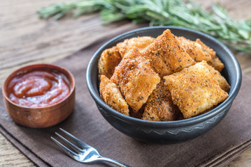 Plate with fried ravioli