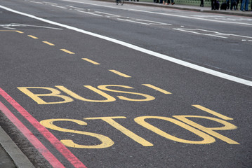Bus stop street information on a bus lane