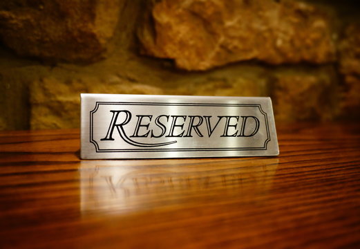 Reserved Wooden Table in Warm Rustic Interior