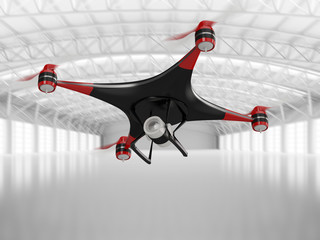 black quadcopter drone with HD camera in flight in interior warehouse