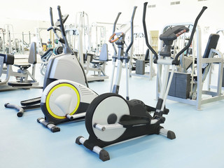 Obraz premium Interior of a fitness hall with fitness equipment