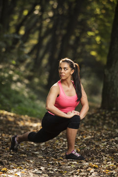 Young girl working out in nature