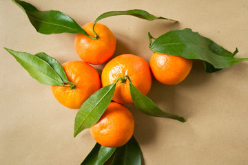 Tangerines in a brown paper