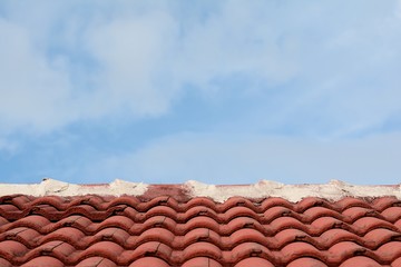 red tile and blue sky