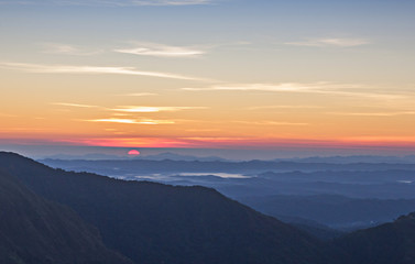 Sunrise on the mountain .
