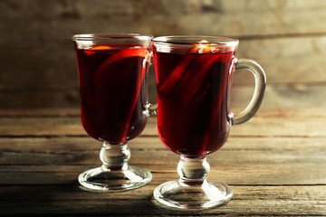 Mulled wine on wooden table