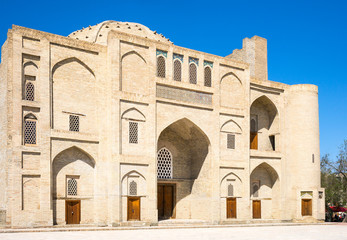 Fototapeta na wymiar Uzbekistan, Bukhara, an old madrassah in the Char Bakr central square