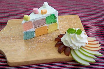 colorful rainbow cake top with marshmallows
