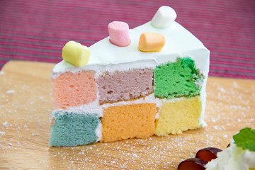 colorful rainbow cake top with marshmallows