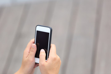 young woman hands hold smart phone