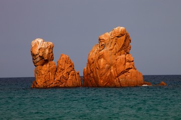 Red Rocks protruding from the sea, Sardinia, Italy