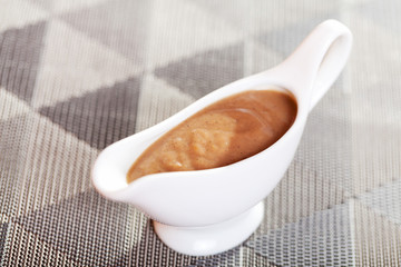 Mushroom sauce in gravy boat