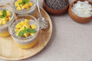 Homemade Chia seed pudding with mango, selective focus, toning