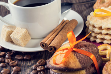 Biscuits and coffee on table