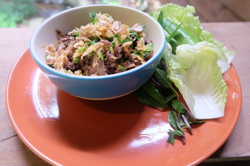 ground pork salad and vegetable in dish
