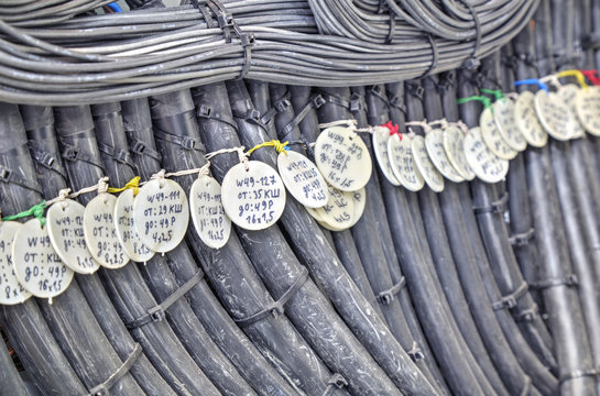 Electrical control cables with caption fields in modern electrical control cubicle closeup