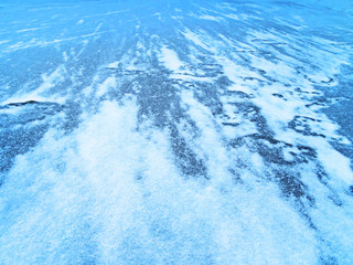 View of drawings on ice from cracks