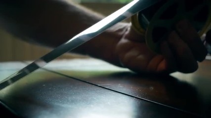 closeup of man looking at old outdated microfiche film