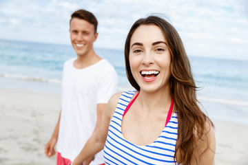 Romantic young couple on the beach