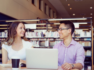 Two young students at the library