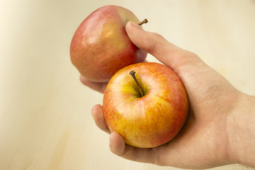 Delicious and fresh apples on wood background
