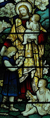 Fototapeta na wymiar Jesus blessing children in stained glass