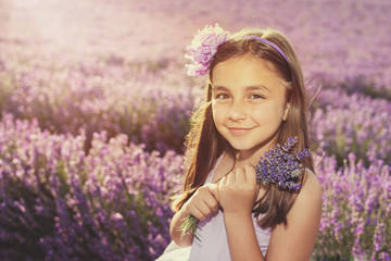 Little girl in a field of lavender