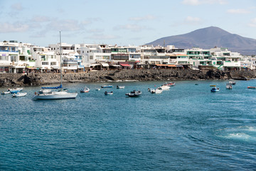 Fototapeta na wymiar Fishing boats in Playa Blanca, Canary Island Lanzarote.Spain