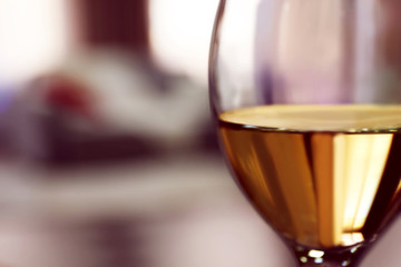 Glass of wine on blurred background