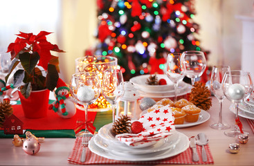 Christmas table setting with holiday decorations
