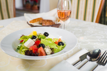 green salad with cheese and vegetables 