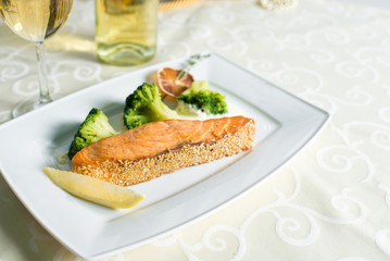 dish of salmon with vegetables in the restaurant