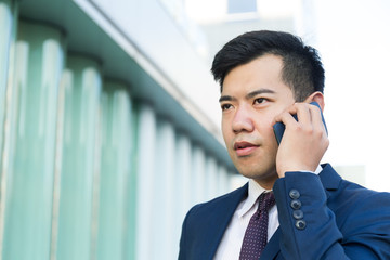 Businessman talk to cellphone at outdoor