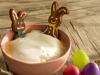 Easter bunny in a cup of coffee - obrazy, fototapety, plakaty
