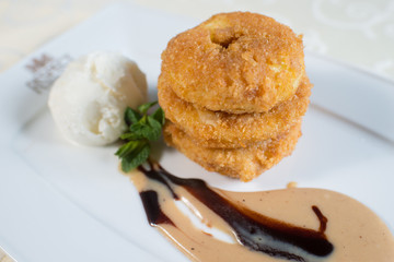 dessert sauce with ice cream and pastries