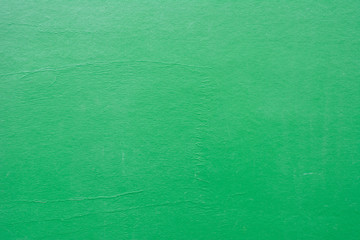 Concrete green wall background.