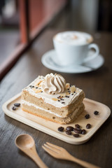 cake on the wood desk in coffee shop